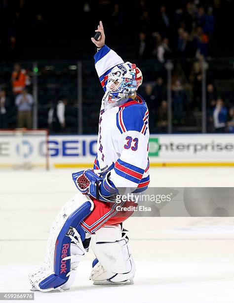 Cam Talbot of the New York Rangers celebrates after he is awarded the first star of the game against the Philadelphia Flyers on November 19, 2014 at...