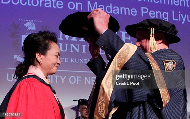 China's First Lady Madame Peng Liyuan during the conferment ceremony of an honorary doctorate on her at Massey Universty on November 20, 2014 in...