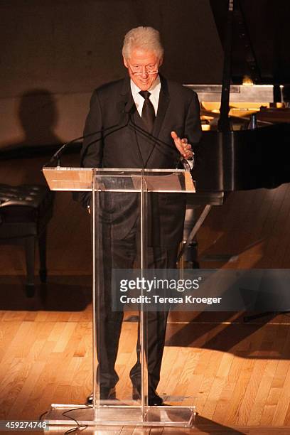 Former President Bill Clinton speaks on stage at the New Republic Centennial Gala at the Andrew W. Mellon Auditorium on November 19, 2014 in...