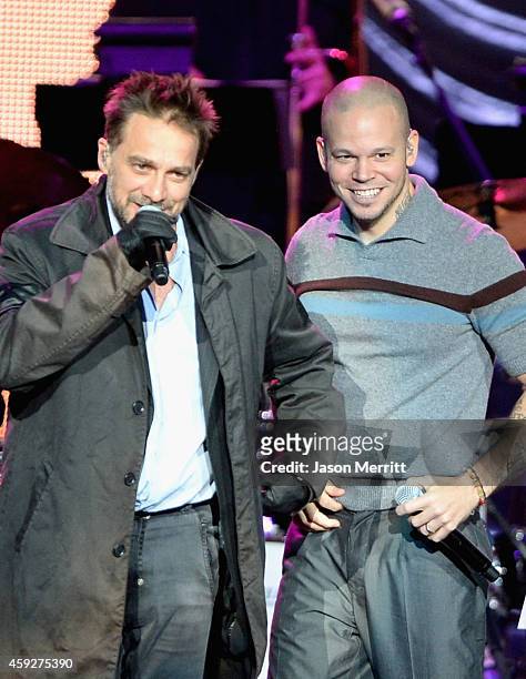 Musician Vicentico and singer Rene Perez Joglar of Calle 13 perform onstage during the 2014 Person of the Year honoring Joan Manuel Serrat at the...