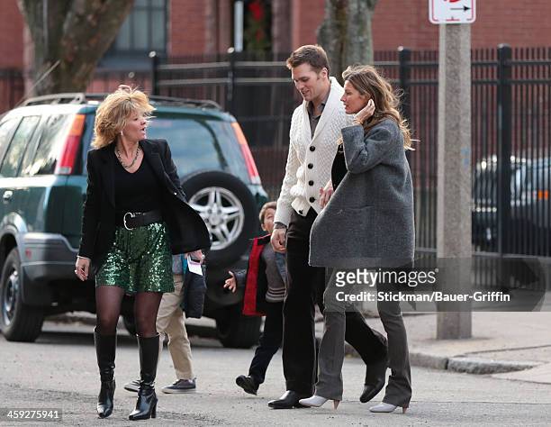 Tom Brady and Gisele Bundchen with sons, John Moynahan and Benjamin Brady are seen on December 24, 2013 in Boston, Massachusetts.