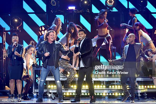 Goyo of ChocQuibTown, singer Carlos Vives, and Tostao and Slow of ChocQuibTown perform onstage during rehearsals for the 15th annual Latin GRAMMY...