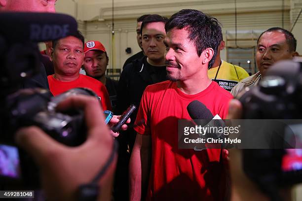 Manny Pacquiao speaks to media during a workout session at The Venetian on November 20, 2014 in Macau, Macau.