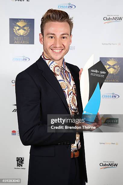 Matthew Mitcham poses with his award for Career Development during the NSWIS Awards at Royal Randwick Racecourse on November 20, 2014 in Sydney,...