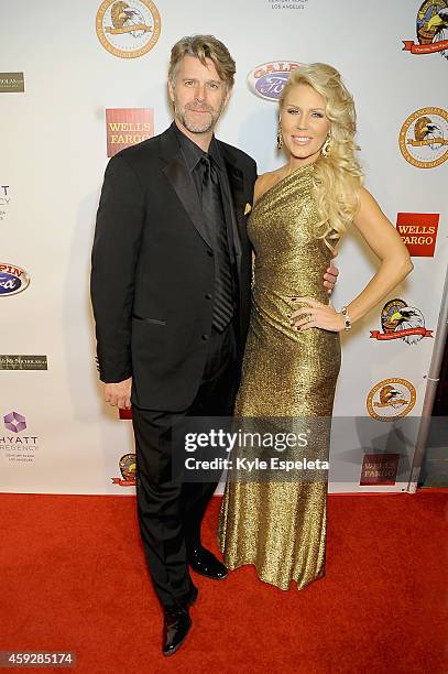 Slade Smiley and Gretchen Rossi arrives at the 2014 Eagle & Badge Foundation Gala at the Hyatt Regency Century Plaza on November 19, 2014 in Los...