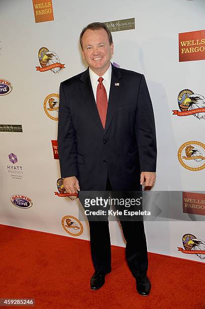 Honoree Chief Jim McDonnell arrives at the 2014 Eagle & Badge Foundation Gala at the Hyatt Regency Century Plaza on November 19, 2014 in Los Angeles,...