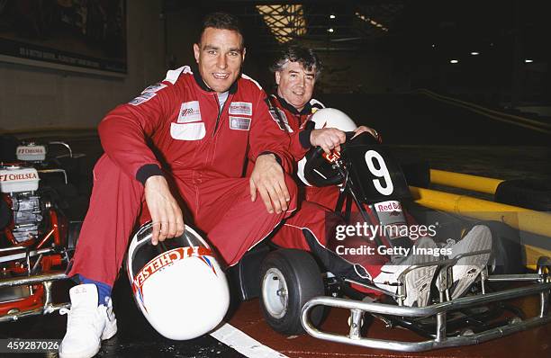 Wimbledon manager Joe Kinnear and player Vinnie Jones look on during a Wimbledon FC go-karting day on February 23, 1994 in London, England.