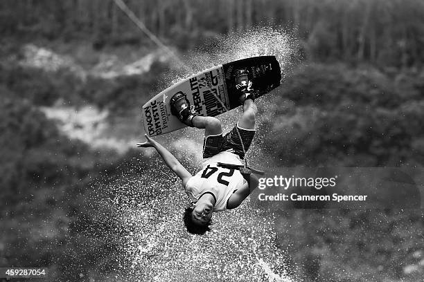 Toshiki Yasui of Japan competes in the semi-final of the Men's Wakeboard during the 2014 Asian Beach Games at Bangneow Dam on November 20, 2014 in...