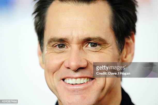 Jim Carrey attends a photocall for "Dumb and Dumber To" on November 20, 2014 in London, England.
