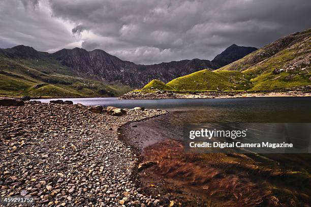 View across a lake in Snowdonia National Park, taken on August 15, 2012.