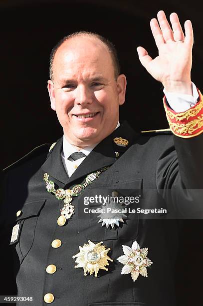 Prince Albert II of Monaco greets the crowd from the palace's balcony during the National Day Parade as part of Monaco National Day Celebrations on...