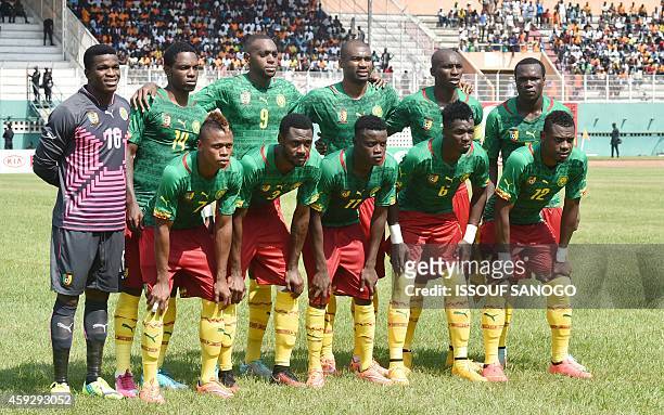 Cameroon's national football team players Joseph Ondoua, Georges Mandjeck, Raoul Loe, Franck Etoundi, Stephane Mbia and Vincent Aboubakar, Clinton...