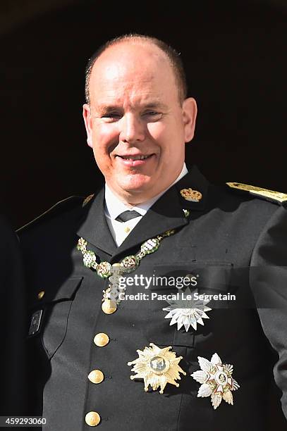 Prince Albert II of Monaco greets the crowd from the palace's balcony during the National Day Parade as part of Monaco National Day Celebrations on...