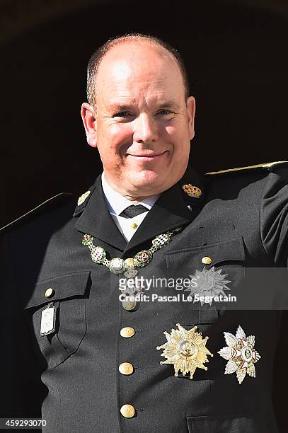 Prince Albert II of Monaco greets the crowd from the palace's balcony during the National Day Parade as part of Monaco National Day Celebrations on...