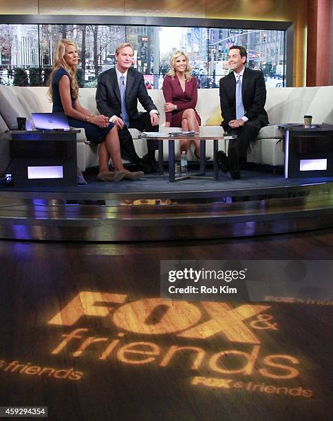 Beth Stern, Steve Doocy, Elisabeth Hasselbeck and Clayton Morris appear on "FOX & Friends" at FOX Studios on November 20, 2014 in New York City.