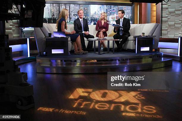 Beth Stern, Steve Doocy, Elisabeth Hasselbeck and Clayton Morris appear on "FOX & Friends" at FOX Studios on November 20, 2014 in New York City.