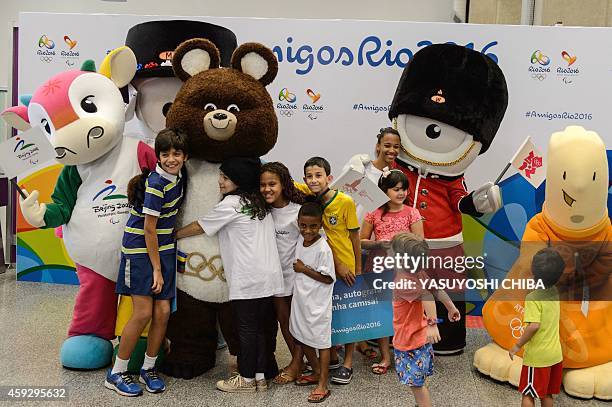 The five previous Olympic mascots, Fu Niu Lele from Beijing 2008, Misha from Moscow 1980, Wenlock , Mandeville from London 2012 and Athena from...