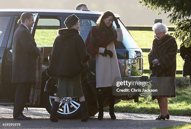 Queen Elizabeth II and Catherine, the Duchess of Cambridge arrive at the Christmas Day service at Sandringham on December 25, 2013 in King's Lynn,...