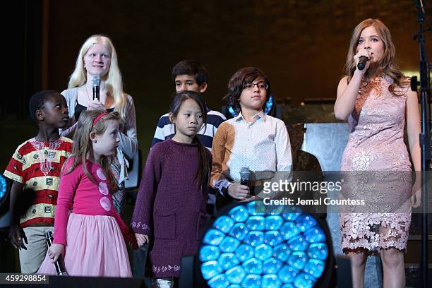 Jackie Evancho speaks on stage at the UNICEF launch of the #IMAGINE Project to celebrate the 25th Anniversary of the rights of a child at United...