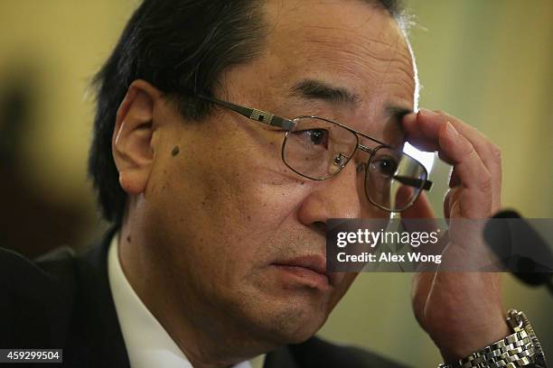 Senior Vice President for Global Quality Assurance at the Takata Corporation Hiroshi Shimizu testifies during a hearing before the Senate Commerce,...