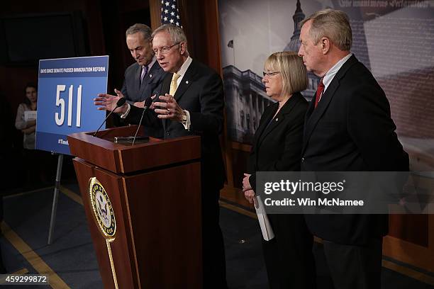 Senate Majority Leader Harry Reid , Sen. Charles Schumer , Sen. Patty Murray and Sen. Dick Durbin speak during a press conference at the U.S. Capitol...