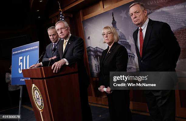 Senate Majority Leader Harry Reid , Sen. Charles Schumer , Sen. Patty Murray and Sen. Dick Durbin speak during a press conference at the U.S. Capitol...