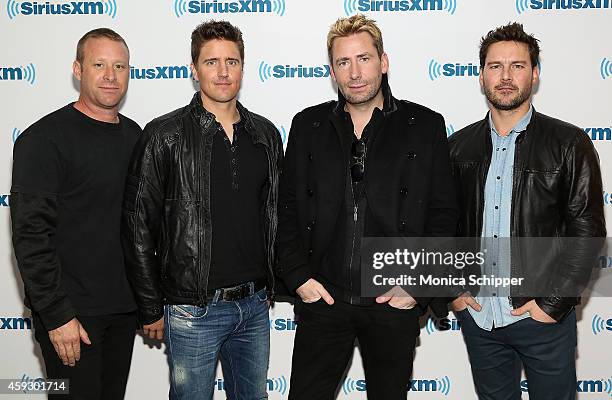 Musicians Mike Kroeger, Daniel Adair, Chad Kroeger and Ryan Peake of Nickelback visit SiriusXM Studios on November 20, 2014 in New York City.