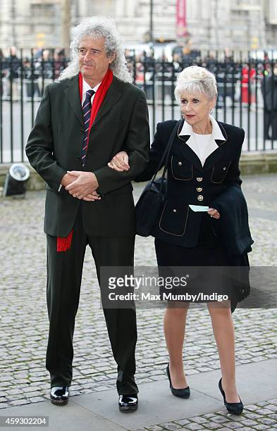 Brian May and Anita Dobson attend a service of thanksgiving for Lady Mary Soames at Westminster Abbey on November 20, 2014 in London, England. Lady...