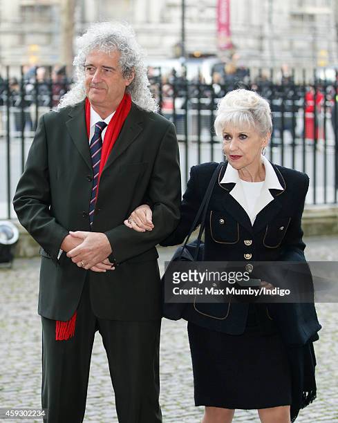 Brian May and Anita Dobson attend a service of thanksgiving for Lady Mary Soames at Westminster Abbey on November 20, 2014 in London, England. Lady...