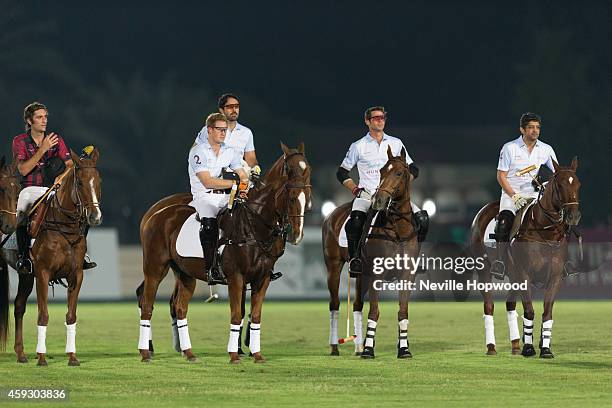 The Huntsman Sentebale Team, Prince Harry, Saeed Bin Drai, Malcolm Borwick and Abdulla Ben Dasmal line up before the start of the Sentebale Polo Cup...