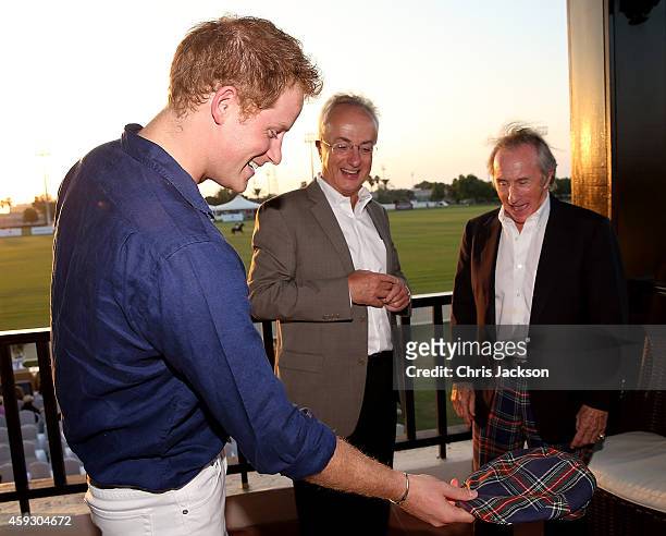 Prince Harry, Philip Green and Sir Jackie Stewart attend the Sentebale Polo Cup presented by Royal Salute World Polo at Ghantoot Polo Club on...