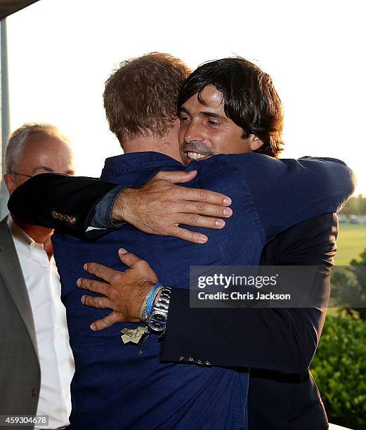 Prince Harry and Nacho Figueras attend the Sentebale Polo Cup presented by Royal Salute World Polo at Ghantoot Polo Club on November 20, 2014 in Abu...