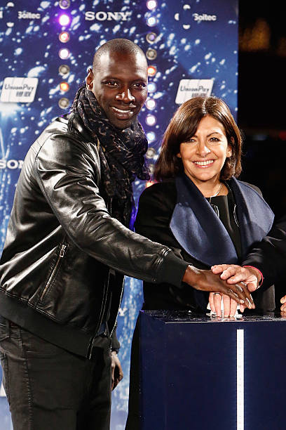 FRA: Omar Sy Launches Christmas Champs-Elysees Illuminations
