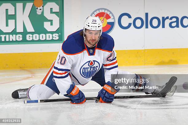 Luke Gazdic of the Edmonton Oilers stretches prior to the game against the Colorado Avalanche at the Pepsi Center on December 19, 2013 in Denver,...