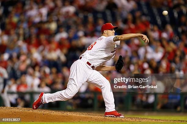 Closer Jonathan Papelbon of the Philadelphia Phillies throws a pitch in the ninth inning of the game against the Atlanta Braves at Citizens Bank Park...