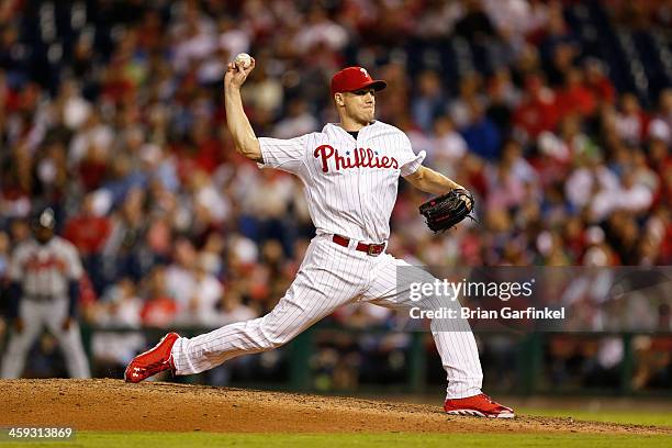 Closer Jonathan Papelbon of the Philadelphia Phillies throws a pitch in the ninth inning of the game against the Atlanta Braves at Citizens Bank Park...