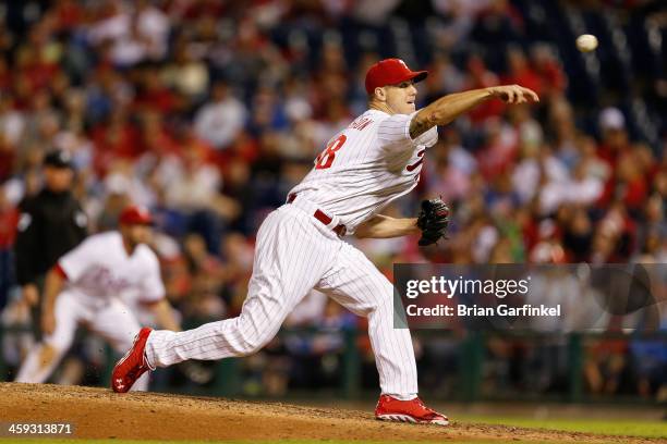 Closer Jonathan Papelbon of the Philadelphia Phillies throws a pitch in the ninth inning of the game against the Atlanta Braves at Citizens Bank Park...