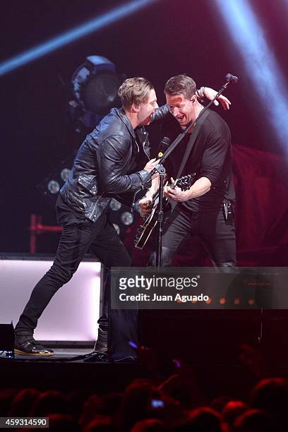 Ryan Tedder and Zach Filkins of OneRepublic performs on stage at Barclaycard Center on November 20, 2014 in Madrid, Spain.