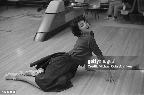Comedian Elaine May poses for a portrait in a bowling alley on February 4, 1961 in New York City, New York.
