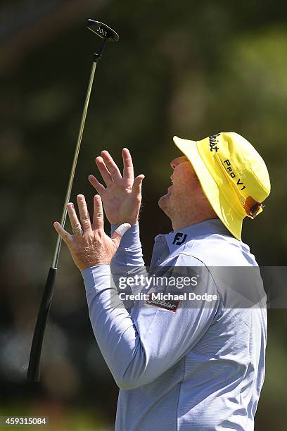 Jarrod Lyle of Austraia reacts after missing a putt on the 3rd hole during day two of the Australian Masters at The Metropolitan Golf Course on...