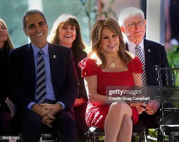 Tony Thomas, Terre Thomas, Marlo Thomas and Phil Donahue listen to Hillary Rodham Clinton speak at the dedication of The Marlo Thomas Center For...