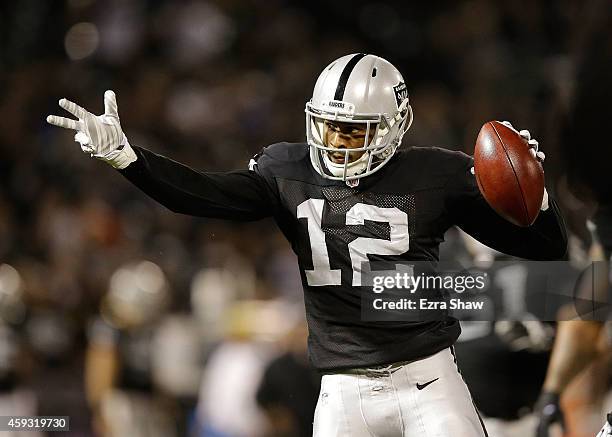 Brice Butler of the Oakland Raiders celebrates a first down in the first quarter of the game against the Kansas City Chiefs at O.co Coliseum on...