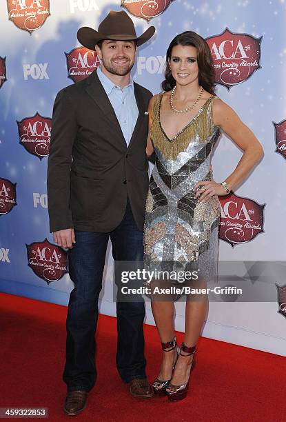 Drivers Ricky Stenhouse Jr. And Danica Patrick arrive at the American Country Awards 2013 at the Mandalay Bay Events Center on December 10, 2013 in...