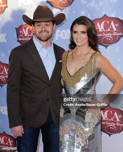 Drivers Ricky Stenhouse Jr. And Danica Patrick arrive at the American Country Awards 2013 at the Mandalay Bay Events Center on December 10, 2013 in...