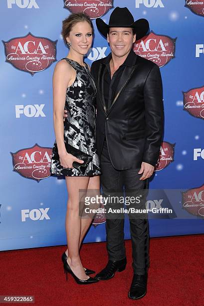 Singer Clay Walker and wife Jessica Craig arrive at the American Country Awards 2013 at the Mandalay Bay Events Center on December 10, 2013 in Las...