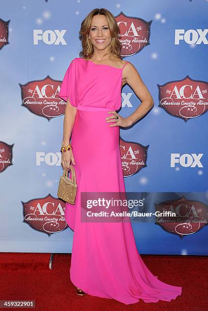 Singer Sheryl Crow arrives at the American Country Awards 2013 at the Mandalay Bay Events Center on December 10, 2013 in Las Vegas, Nevada.