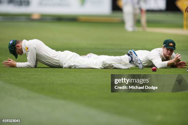 Michael Clarke of Australia reacts after Steve Smith drops a catch to dismiss Michael Carberry of England during one of the Fourth Ashes Test Match...