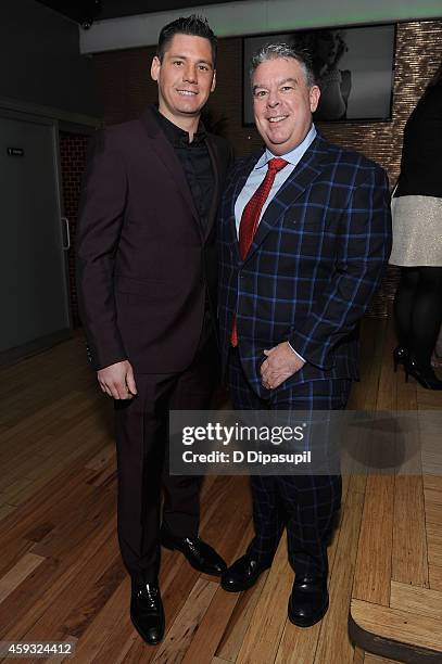 Radio host Elvis Duran and Alex Carr attend Out100 2014 presented by Buick on November 20, 2014 in New York City.