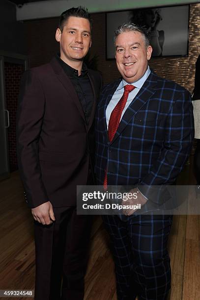 Radio host Elvis Duran and Alex Carr attend Out100 2014 presented by Buick on November 20, 2014 in New York City.