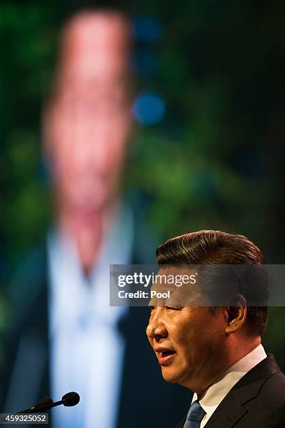 Chinese President Xi Jinping addresses the audience at a luncheon at SkyCity Grand Hotel on November 21, 2014 in Auckland, New Zealand. President Xi...